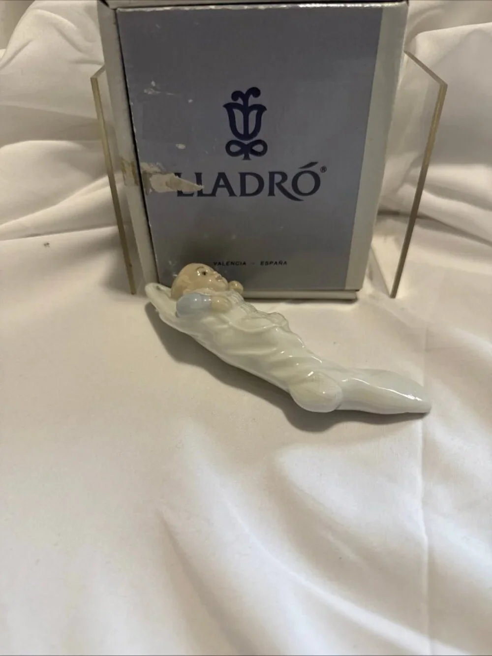 Lladro Baby in stocking